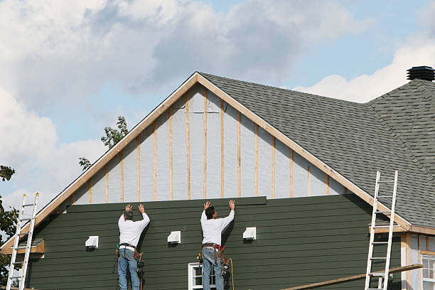 Professional Siding Installation technician working in Butler, GA